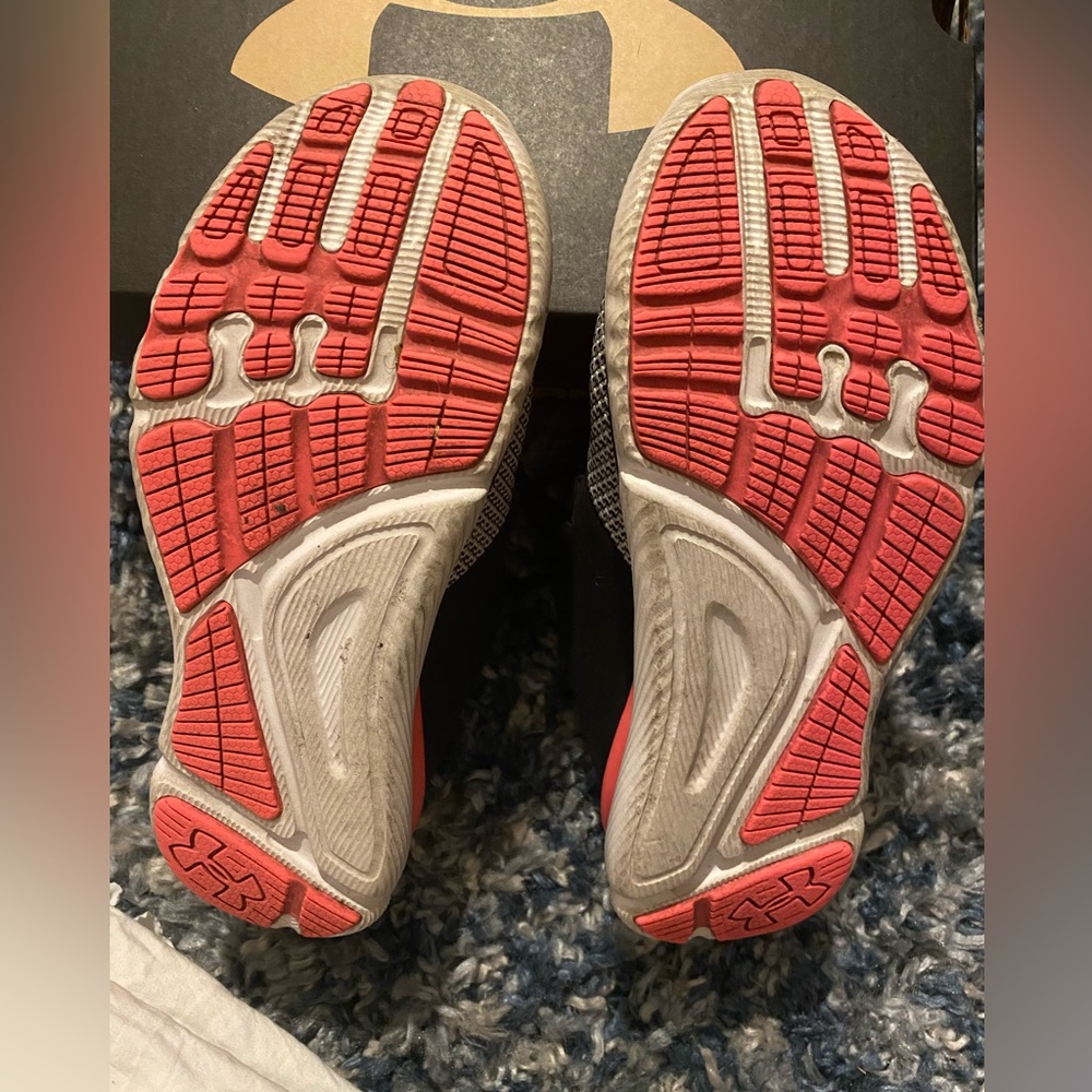 Kids Size 3.5, Under Armour shoes. Pink and black.
